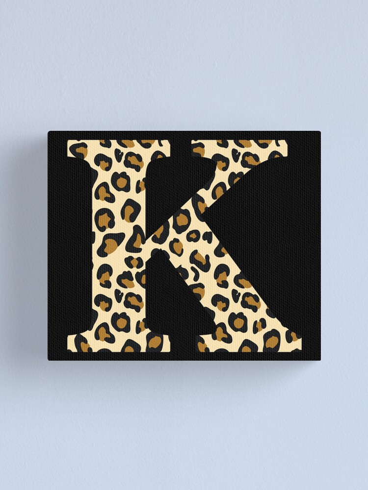 monogram name initial capital letter K English alphabet cool cheetah cat animal fur print pattern skin cute design on black background monogram name initial capital letter K English alphabet cool cheetah cat animal fur print pattern skin cute design on black background