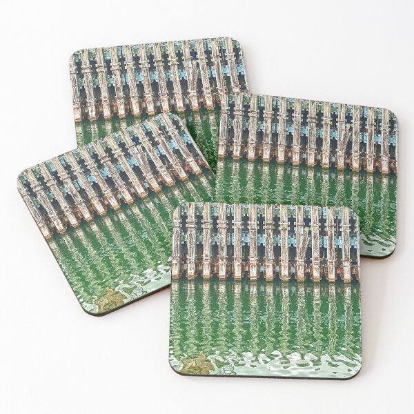 Item preview, Dock pilings reflected in Sassnitz Harbor, Rügen Island, Germany designed and sold by Michael Brewer.
