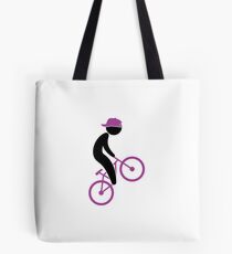 A cyclist doing tricks on his bike Tote Bag