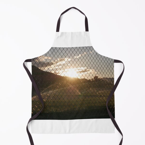 Item preview, Sprinklers watering the field at sunset designed and sold by SlappinTees.