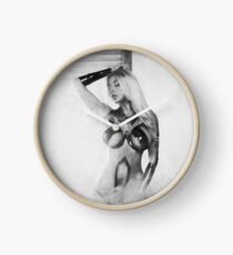 Sexy girl in a black tape Clock