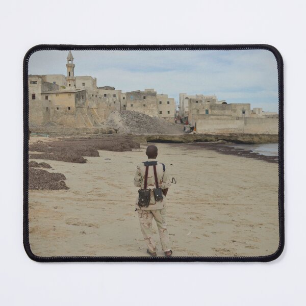 Item preview, A member of the Somali National Army stands guard on a beach near the city of Merca designed and sold by VintageSomalia.
