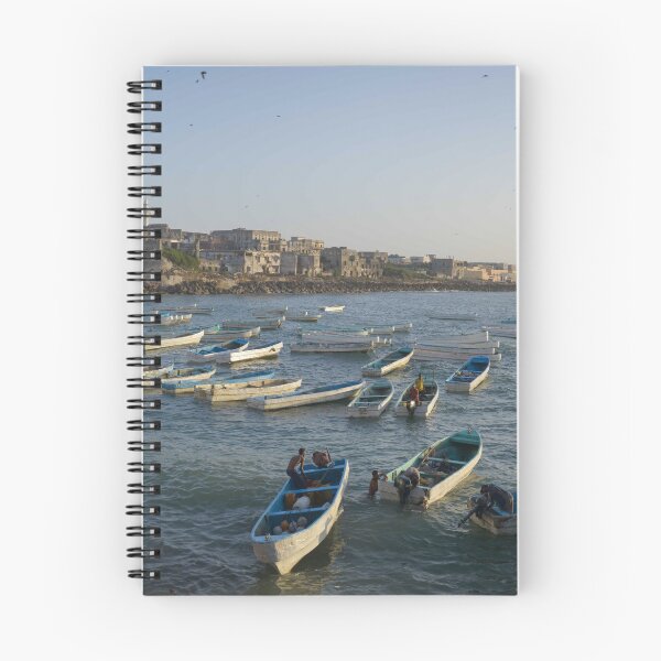 Item preview, Fisherman ready their boats to go out onto the open ocean in the old port of Mogadishu - Somalia designed and sold by VintageSomalia.