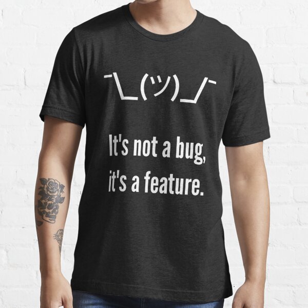 Shrug It's not a bug, it's a feature. Programmer Excuse White Design Essential T-Shirt