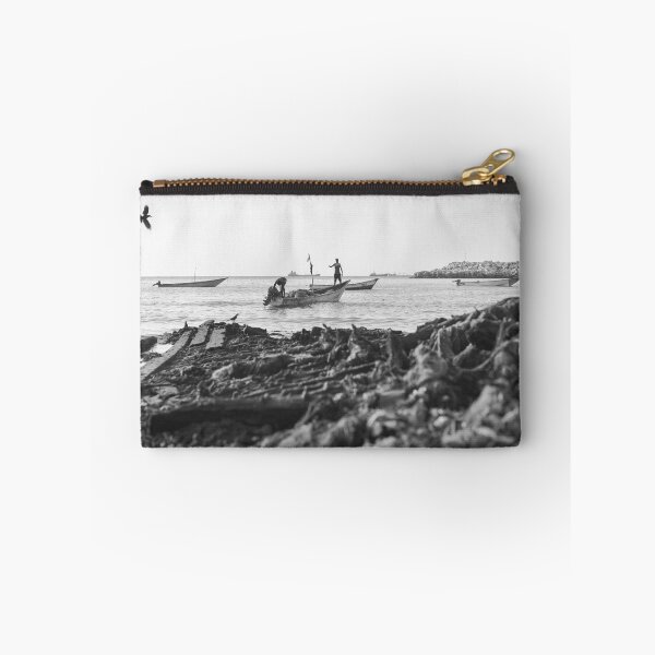 Item preview, Two fishermen prepare their boat for a night of fishing at a port in Bossaso, Puntland designed and sold by VintageSomalia.