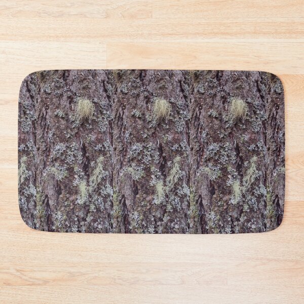 Item preview, Tuft of moss growing on pine tree bark in the forest designed and sold by rhodabear.