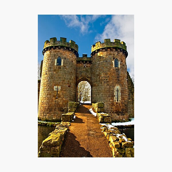 Whittington Castle gatehouse with snow Photographic Print