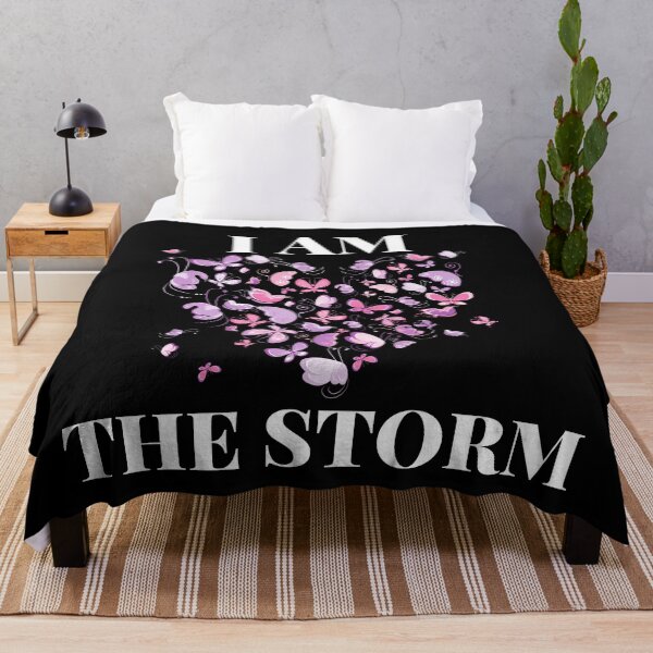 Item preview, I am the storm, inspirational quote about life and strength with a colorful butterfly heart design designed and sold by Auntieck.