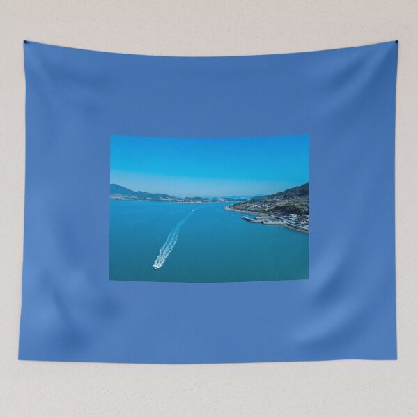 Item preview, A drone shot of a motorboat running on the sea in Dunbyeong Island, Goheung, South Korea’s southern coast,Korea designed and sold by human8891.