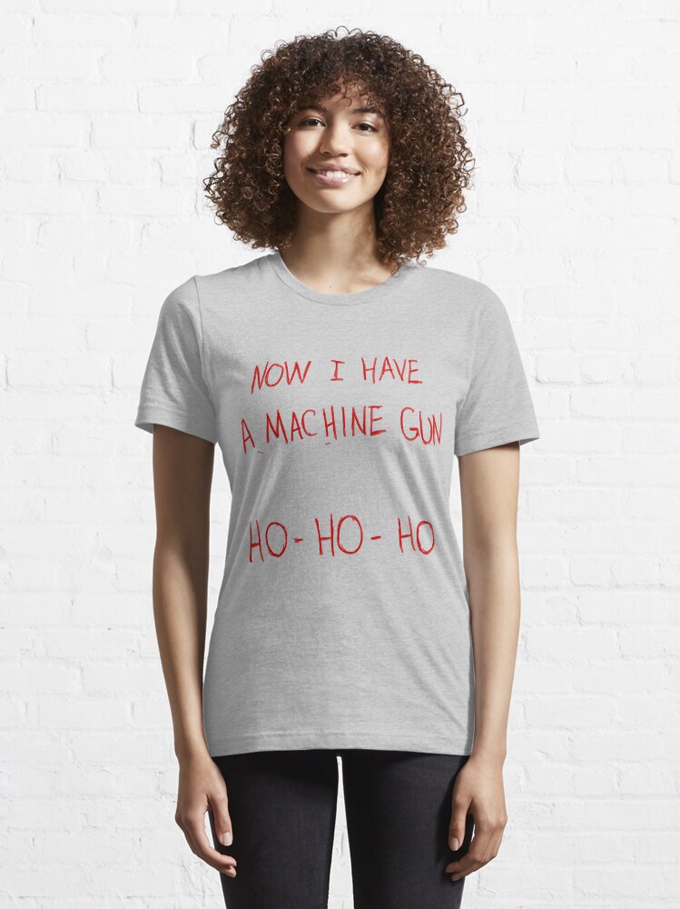 Thumbnail 6 of 7, Essential T-Shirt, Now I Have A Machine Gun Ho-Ho-Ho designed and sold by Elton McManus.