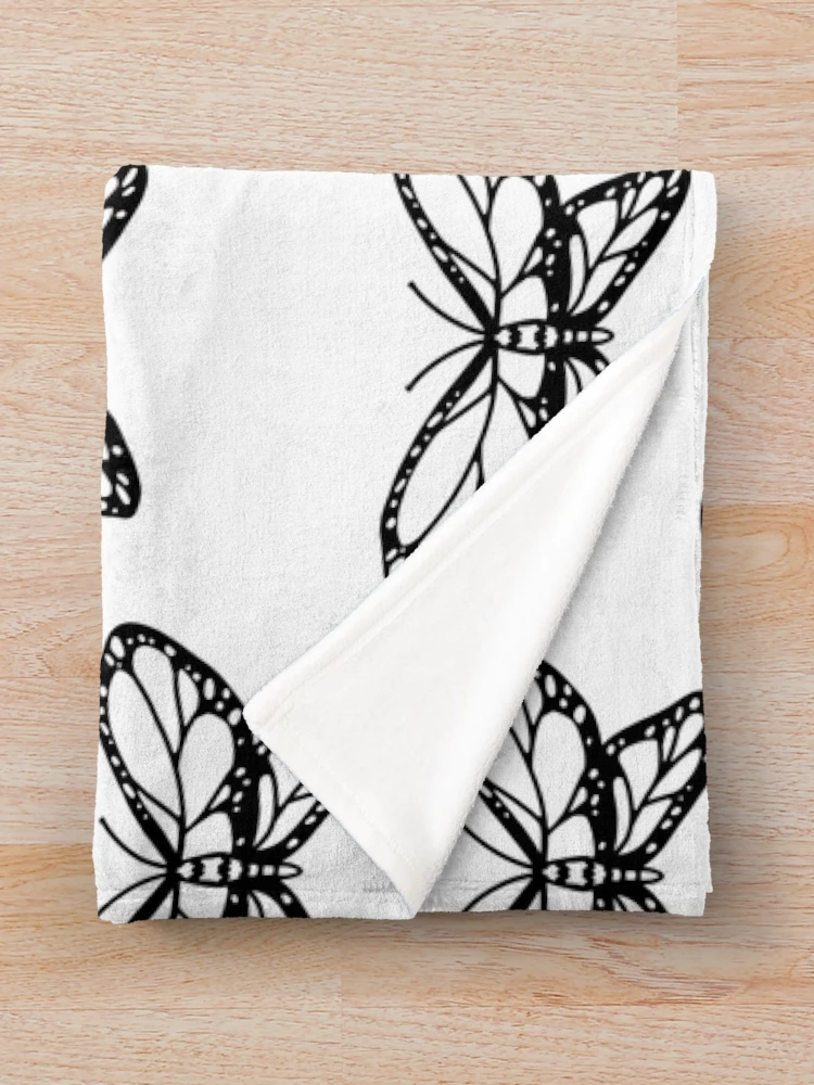 Imagen 3 de 6, Manta con la obra Mariposa, diseñada y vendida por Reeseworks.