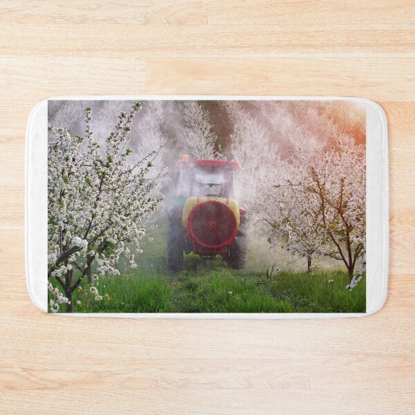 Item preview, tractor sprays insecticide in cherry orchard agriculture designed and sold by goceris.