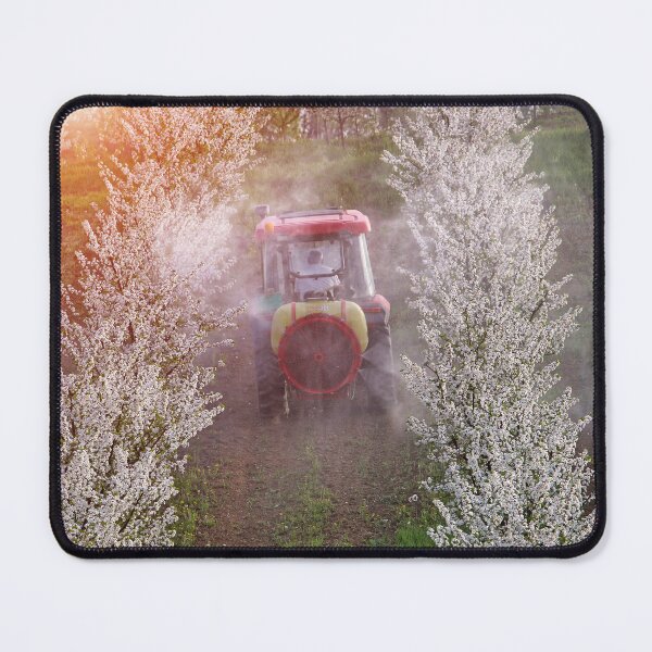 Item preview, tractor sprays insecticide in cherry orchard agriculture springtime designed and sold by goceris.