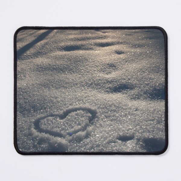 Item preview, Heart shape with finger in white shiny snow. Sunset sun is shining through the trees. Cold winter day. Animal footsteps. Love is in the air. designed and sold by BumbleVee ☀️.
