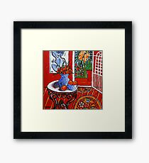 red interior with tropical garden view Framed Print