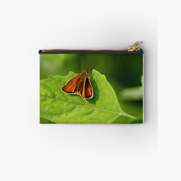 Item preview, Rust-Colored Moth resting on a leaf designed and sold by vernonite.