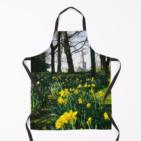 Item preview, Park full of daffodils and stone church in the background designed and sold by NavorolArt.