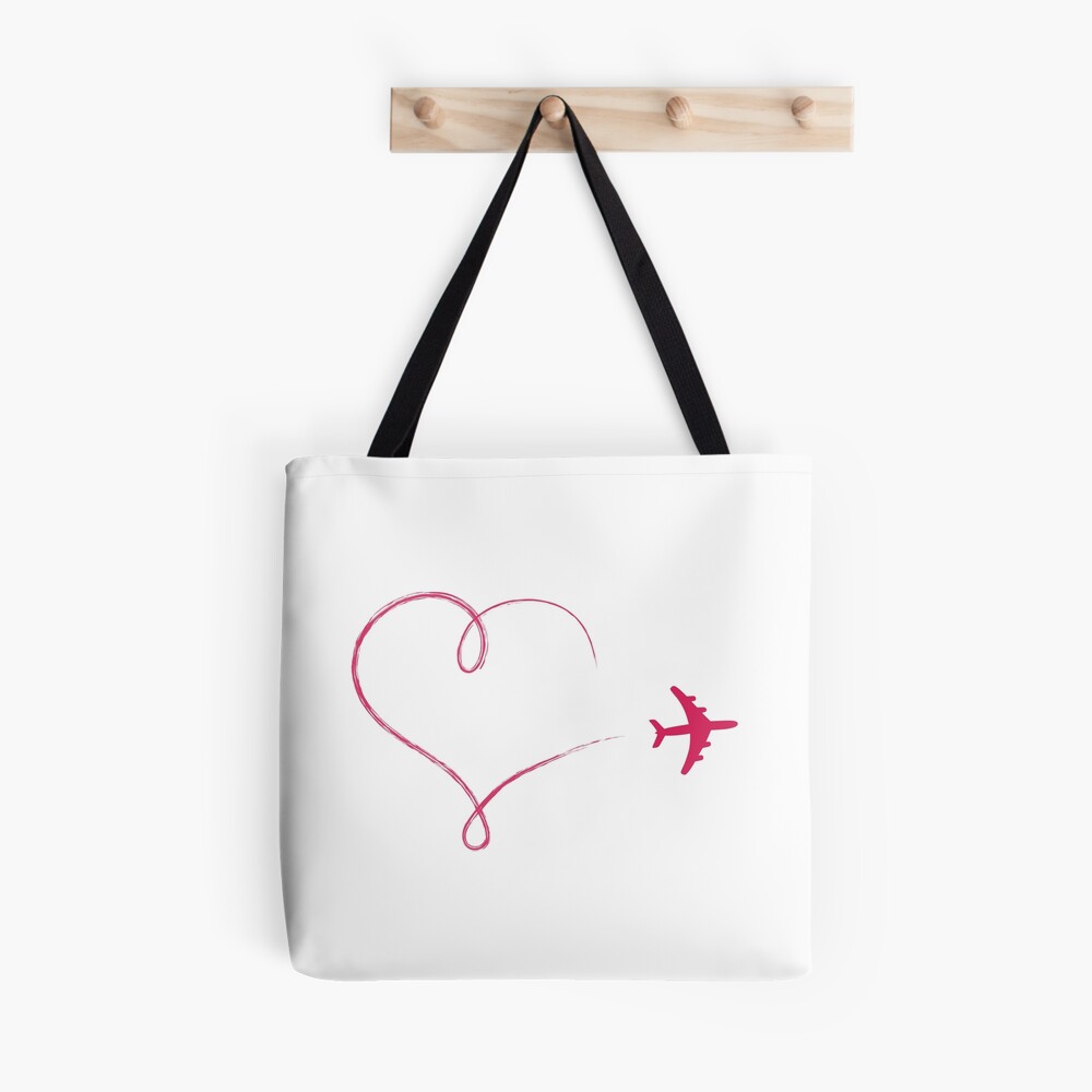 Heart shaped icon in air, made by plane Tote Bag for Sale by pixxart