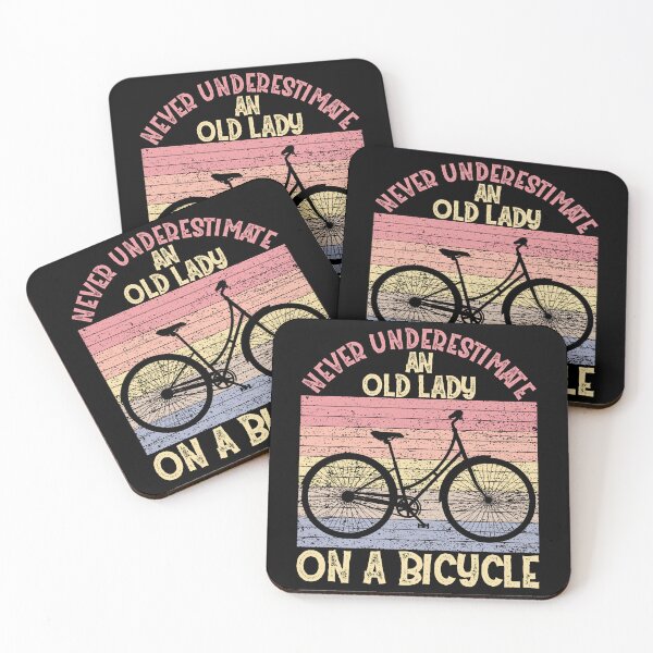 Item preview, Never Underestimate An Old Lady On a Bicycle designed and sold by Hapoel.