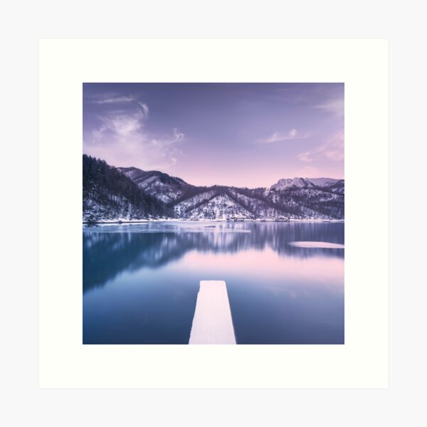 Iced lake and snowy pier in Apuan mountains. Tuscany, Italy Art Print