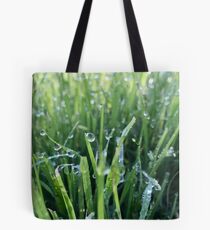 Dew drops on green grass Tote Bag