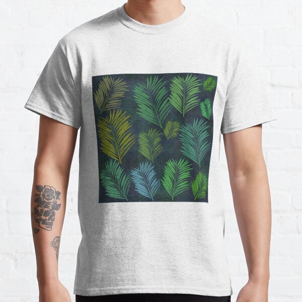 Modèle sans couture de feuilles vertes sur fond texturé bleu foncé T-shirt classique