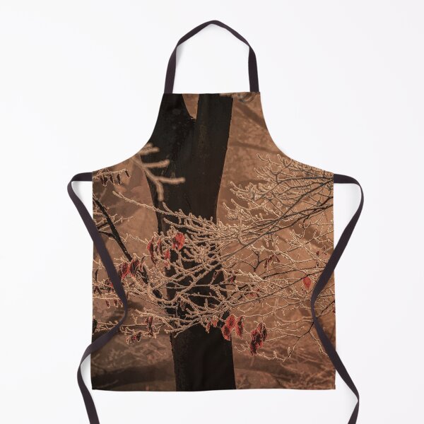 Item preview, Sun illuminates the branches and their few remaining leaves all covered in frost canvas print. designed and sold by Nils Petter Stein.