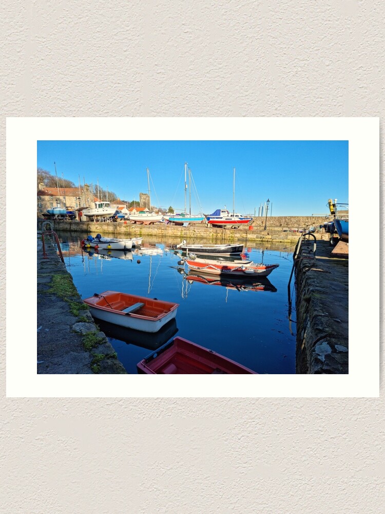 "Vibrant shades of red and blue of the fishing boats at Dysart Harbour in Kirkcaldy" Art Print