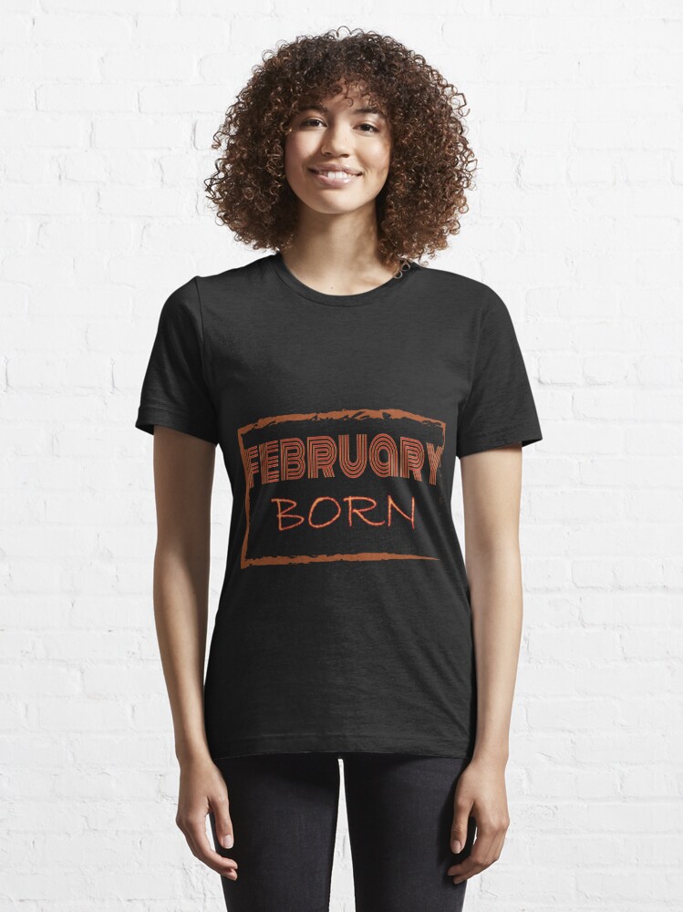 Disover BORN IN FEBRUARY Essential T-Shirt