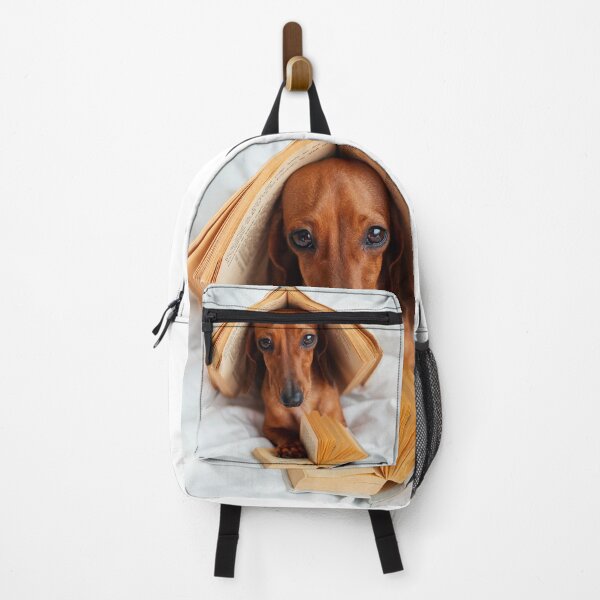 Item preview, Cute Dog With Books in Bed designed and sold by ONORMAL.