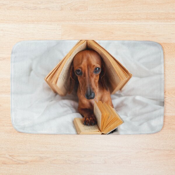 Item preview, Cute Dog With Books in Bed designed and sold by ONORMAL.