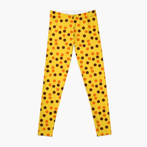 orange and brown polka dots on a yellow background Leggings