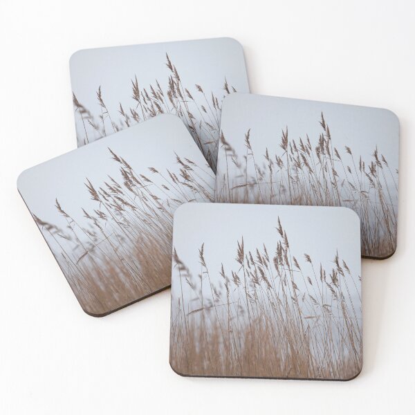 Item preview, beginning of winter it is snowing foreground panicles of dry reeds  designed and sold by mrivserg.
