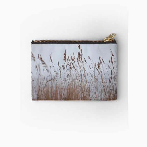 Item preview, beginning of winter it is snowing foreground panicles of dry reeds  designed and sold by mrivserg.