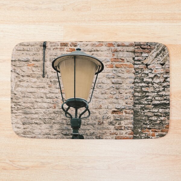 Item preview, Old lamp on a red brick wall | Elburg, The Netherlands | Street & Travel Photography designed and sold by Diana van Neck.