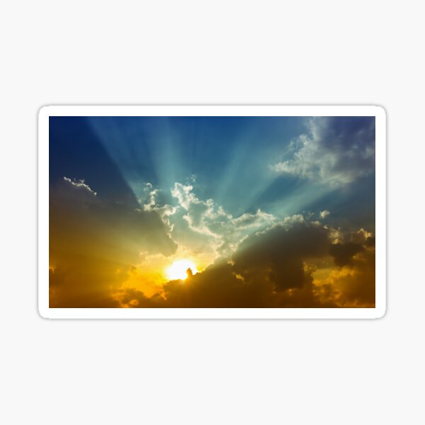 Dark clouds in a sunrise Sticker