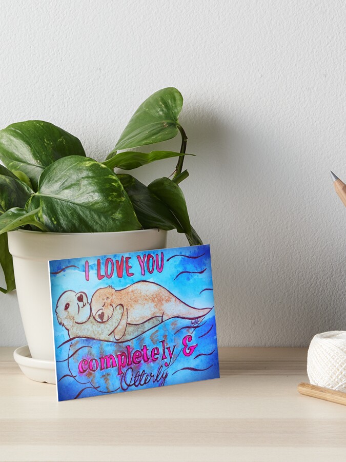 Thumbnail 1 of 2, Art Board Print, I Love You Completely And Otterly designed and sold by Shilissimo.
