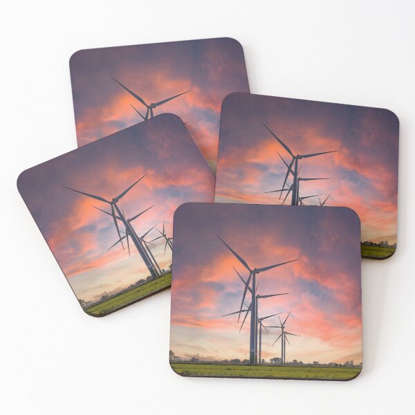 Item preview, Windmill farm on green meadow under moody red sky designed and sold by Lukasz Szczepanski.