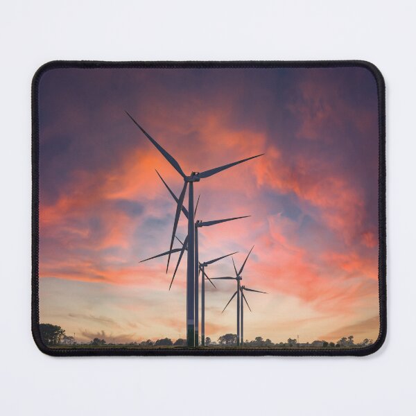 Item preview, Windmill farm on green meadow under moody red sky designed and sold by Lukasz Szczepanski.