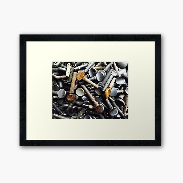 A pile of pegs Framed Art Print