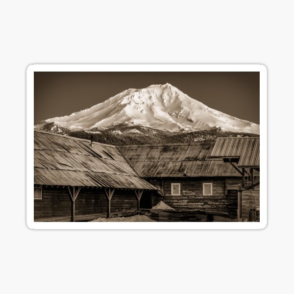 Aged Mt. Shasta behind an old building at the Mill in McCloud California Sticker
