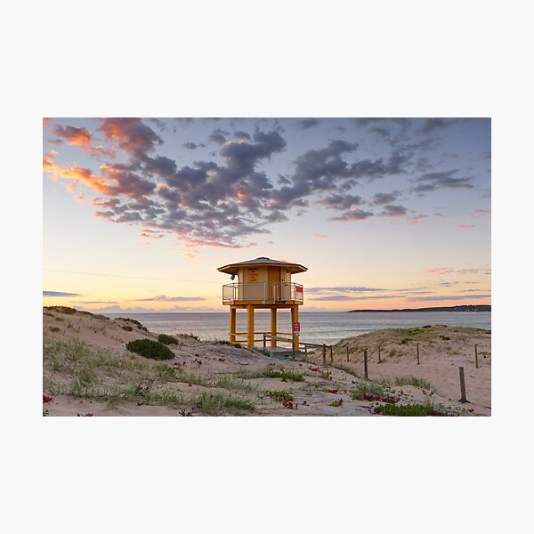 Lifeguard tower at the beach with pretty sunrise Photographic Print