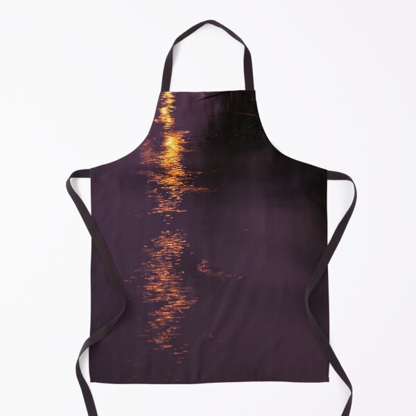 Item preview, Orange lights reflecting in the swampy grass filled river waters at night designed and sold by James-Cole.