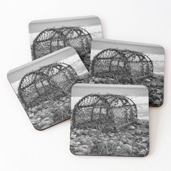 Item preview, Abandoned lobster pot on the beach in black and white designed and sold by yackers1.