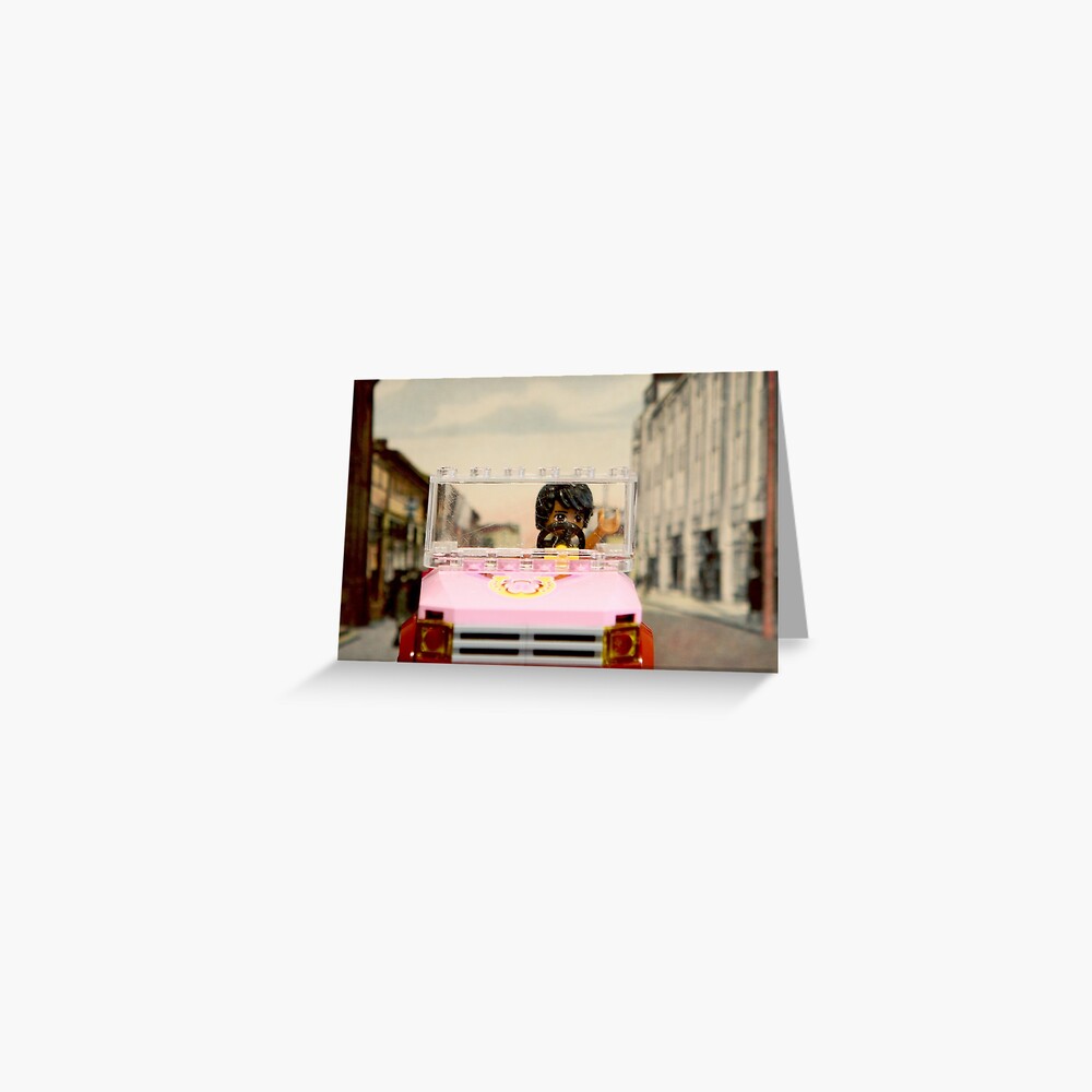 Legoman arrives to town streetscape Greeting Card