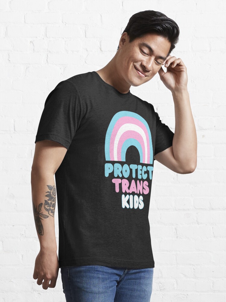 Discover PROTECT TRANS KIDS WITH TRANS FLAG COLORS ON RAINBOW | Essential T-Shirt 