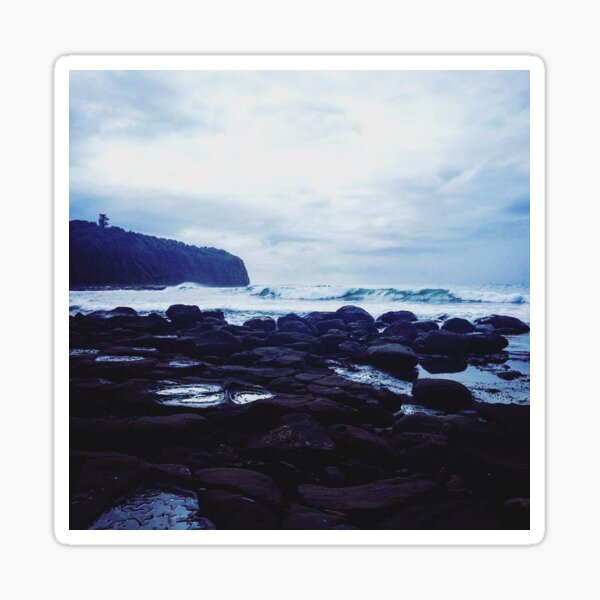 A Solemn Moment at the Rocky Beach Sticker