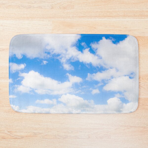 Item preview, Bright fluffy white clouds against a glowing blue sky designed and sold by James-Cole.