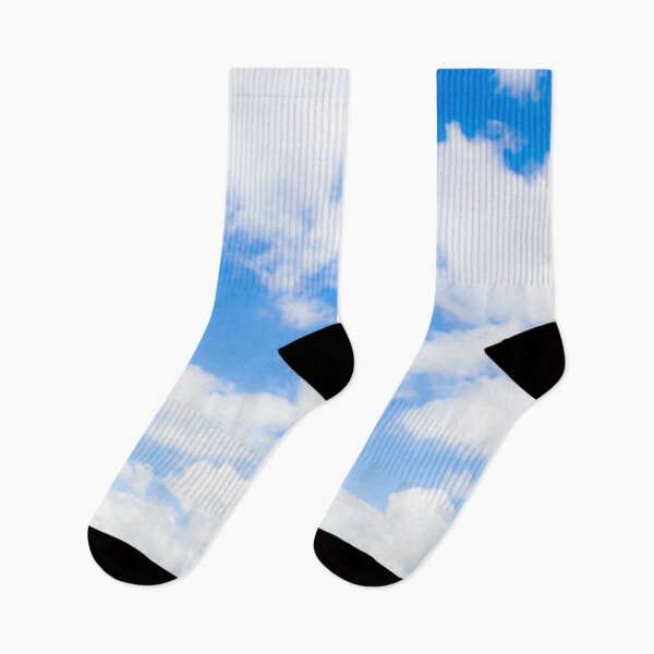 Item preview, Bright fluffy white clouds against a glowing blue sky designed and sold by James-Cole.