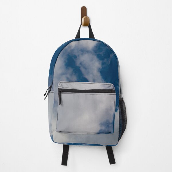Item preview, A hole through thick fluffy white clouds showing the deep blue sky behind designed and sold by James-Cole.